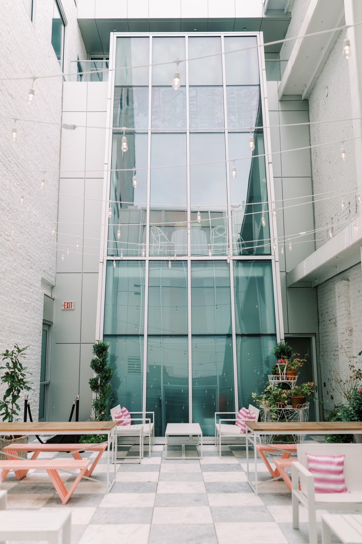 The courtyard with the greenery that is perfect for photos at your Quirk Hotel Wedding